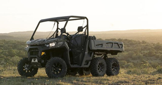 ATV parked on an NZ farm at sunset 