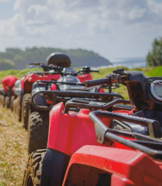 Close up of a line of quad bikes on an NZ farm