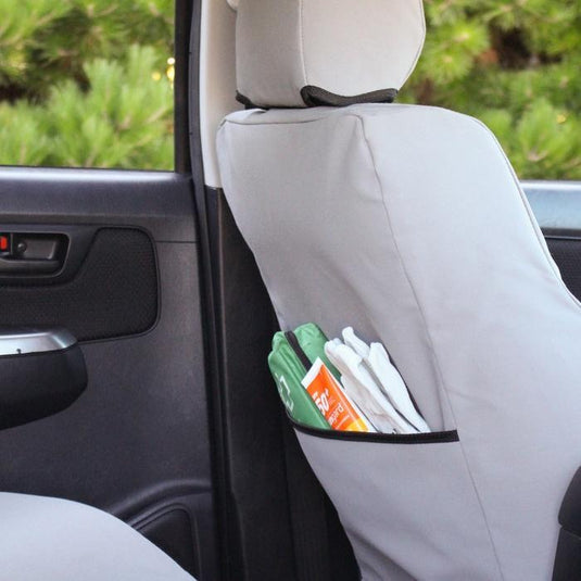 Grey rugged valley seat cover with pocket fitted to passenger seat